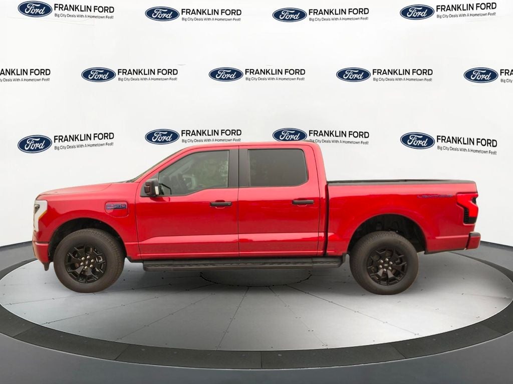 Used 2025 Ford F-150 Lightning XLT with VIN 1FTVW3LK9SWG05864 for sale in Franklin, MA