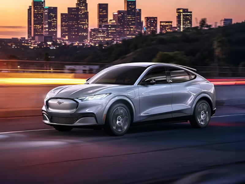 Ford Mustang Mach-E driving on the city streets