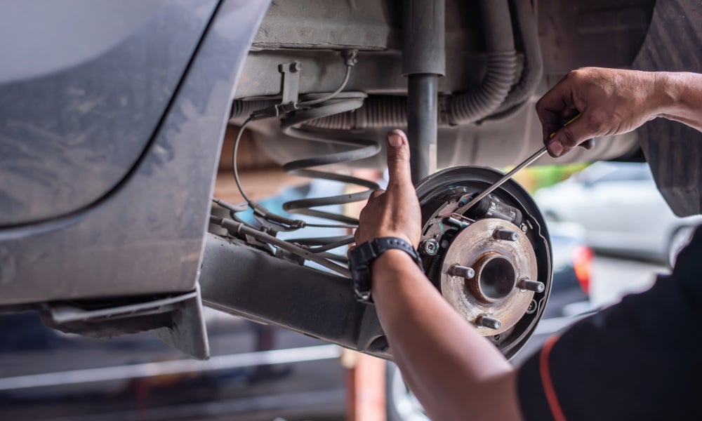 Franklin Ford Service Technician replacing vehicle part